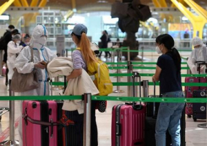 El pasaporte de vacunaci&oacute;n del COVID-19: &iquest;Un nuevo requisito para los viajes?